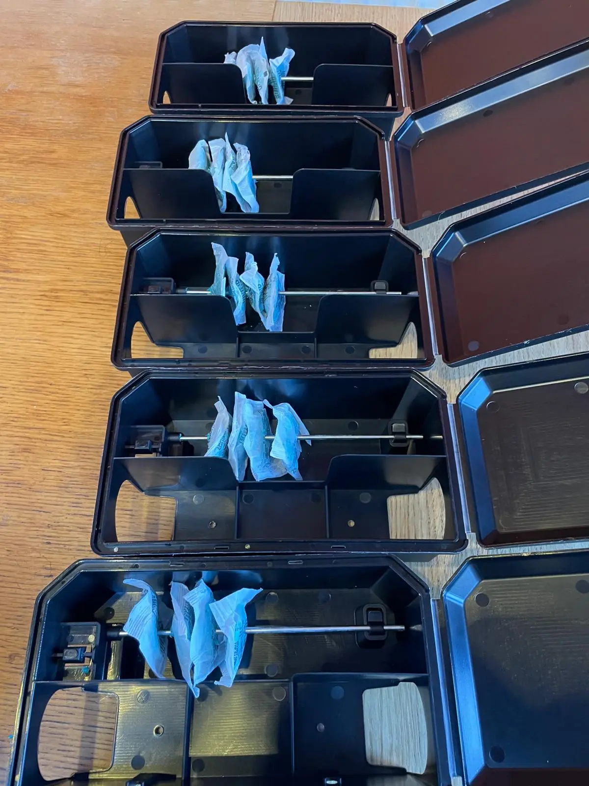 Professional rodent bait blocks loaded into tamper-resistant bait stations for commercial rat treatment Professional rodent bait blocks loaded into tamper-resistant bait stations for commercial rat treatment