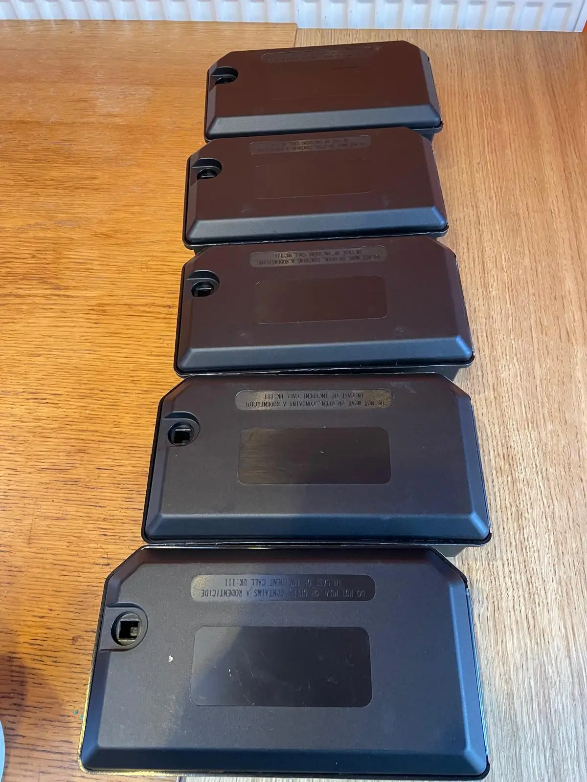 Tamper-resistant rodent bait stations used in commercial mice treatment Tamper-resistant rodent bait stations used in commercial mice treatment